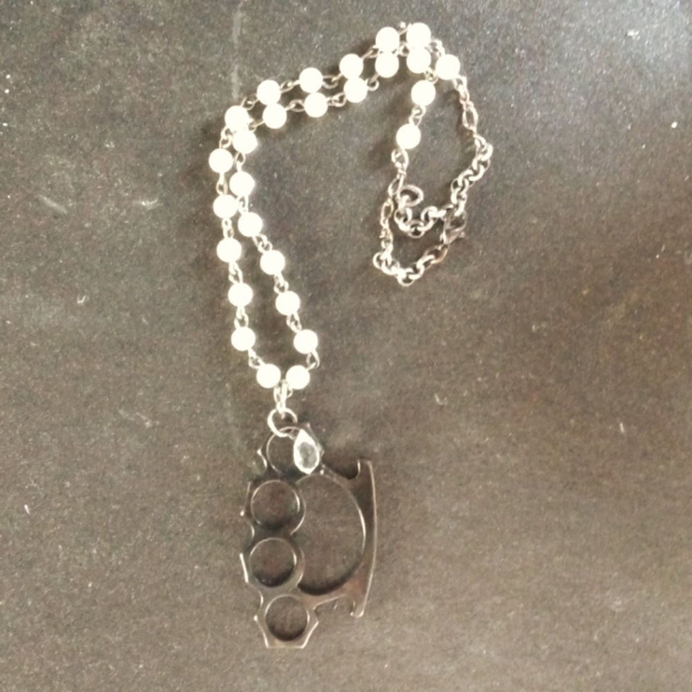 Brass knuckles Necklace